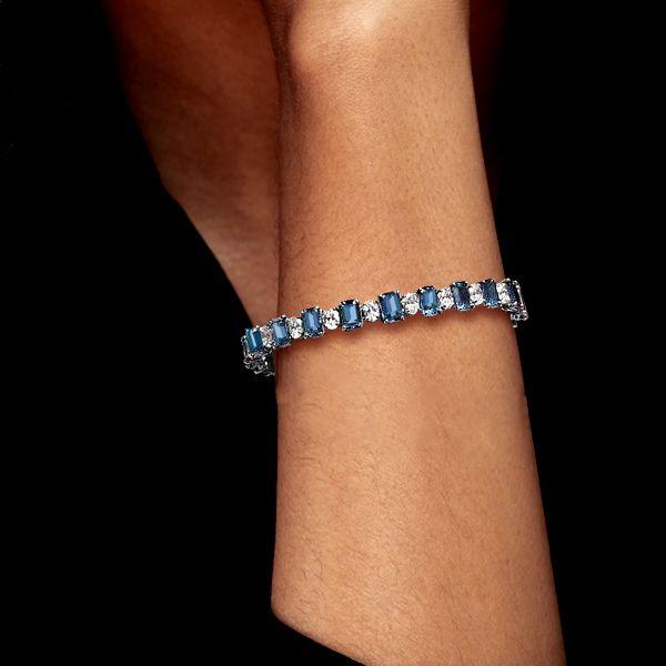 Emerald Cut Blue Topaz Tennis Bracelet in Sterling Silver