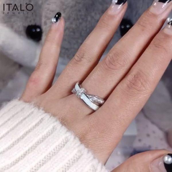 Knot Design White Sapphire Wedding Band in Sterling Silver
