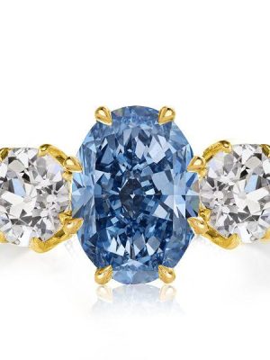 Oval Blue Topaz Three Stone Engagement Ring - 18K Gold Plated Sterling Silver