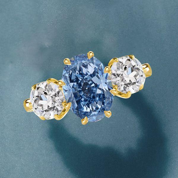 Oval Blue Topaz Three Stone Engagement Ring - 18K Gold Plated Sterling Silver