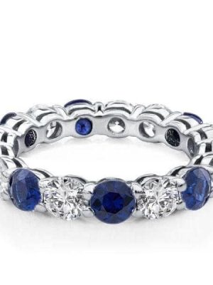 Round Cut Blue Sapphire Eternity Wedding Band in Rhodium Plated Sterling Silver