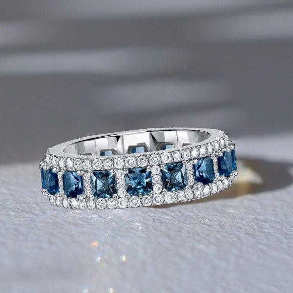 Princess Cut Blue Topaz Eternity Band Ring in Rhodium Plated 925 Sterling Silver