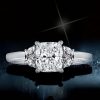 Three Stone Cushion Cut Engagement Ring in Rhodium-Plated Sterling Silver