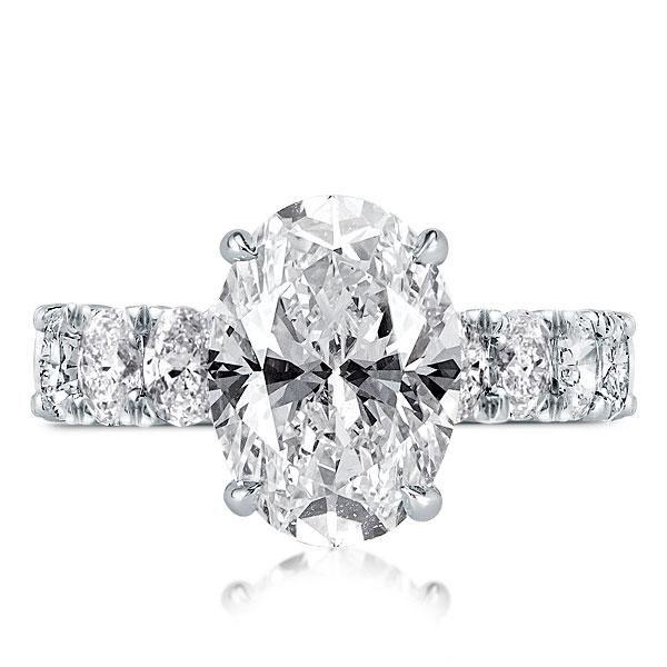 Oval Created White Sapphire Hidden Halo Engagement Ring - Sterling Silver