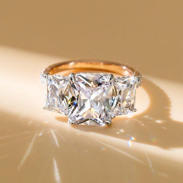 Two Tone Three Stone Radiant Cut Engagement Ring in Sterling Silver