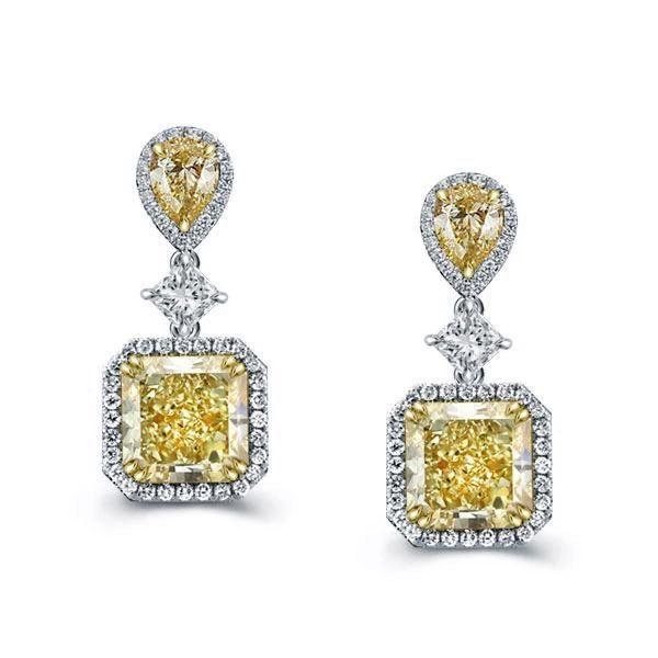 Sterling Silver Drop Earrings with 9.52 CT. TW. Center Stone