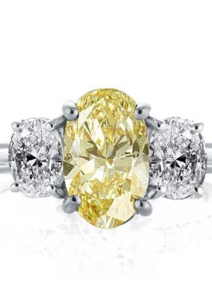 Oval Created Topaz Three Stone Engagement Ring in Sterling Silver