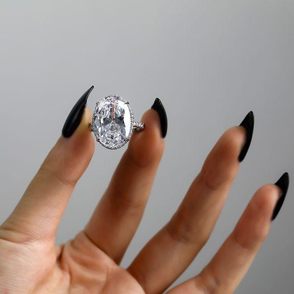 Oval Cut Sterling Silver Engagement Ring - White Gold Finish