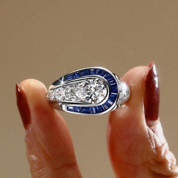Art Deco Blue Sapphire Pear Shaped Engagement Ring in Rhodium Plated Sterling Silver