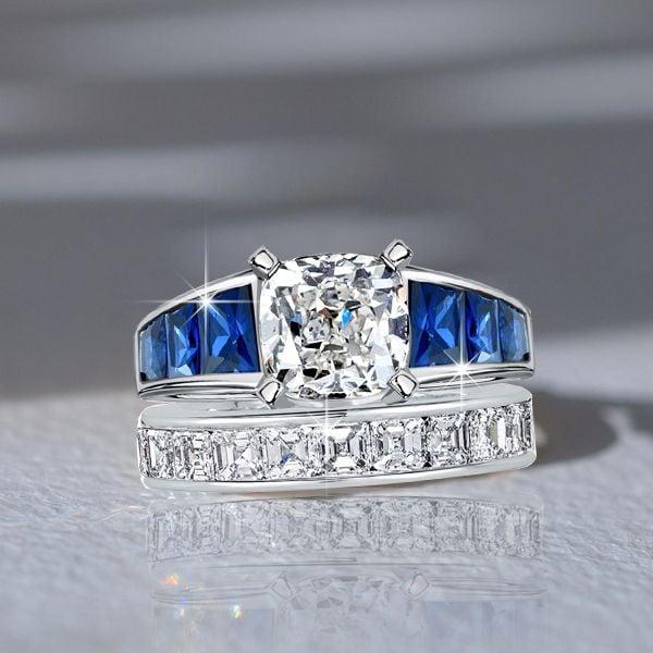 Cushion Cut White and Blue Sapphire Engagement Ring Set in Rhodium-Plated Sterling Silver