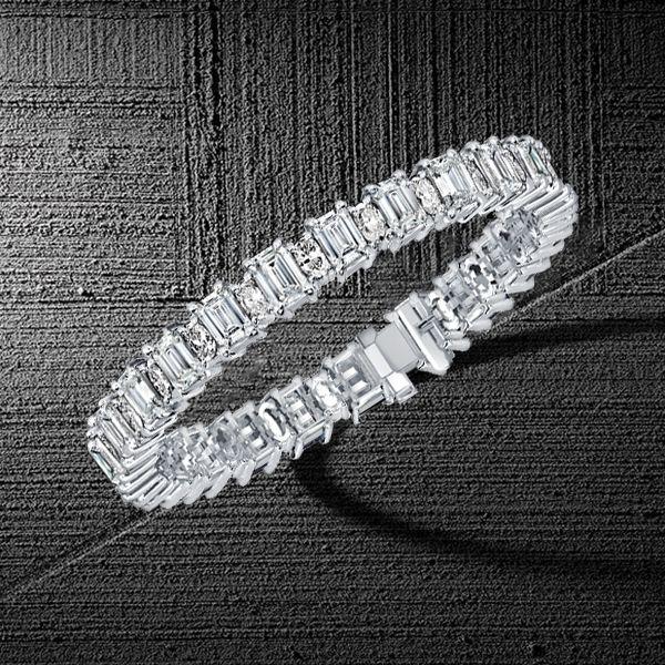 Emerald & Oval Cut White Sapphire Sterling Silver Tennis Bracelet (6-9 inch)