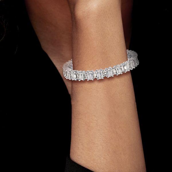 Emerald & Oval Cut White Sapphire Sterling Silver Tennis Bracelet (6-9 inch)
