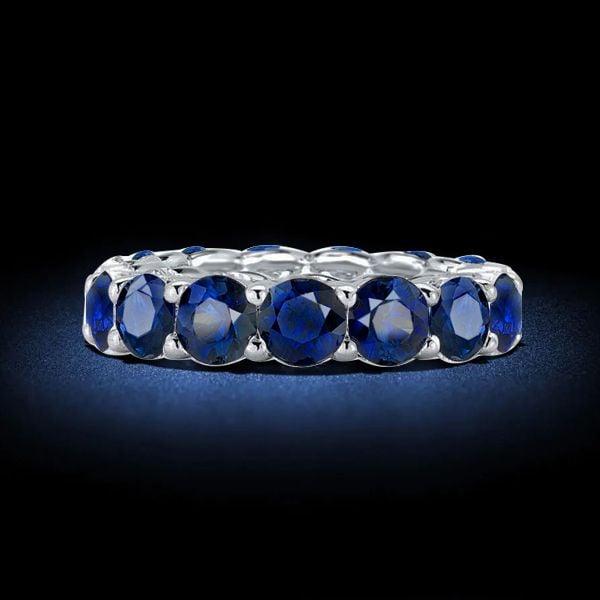 U-Prong Blue Sapphire Eternity Wedding Band in Sterling Silver with Rhodium Plating